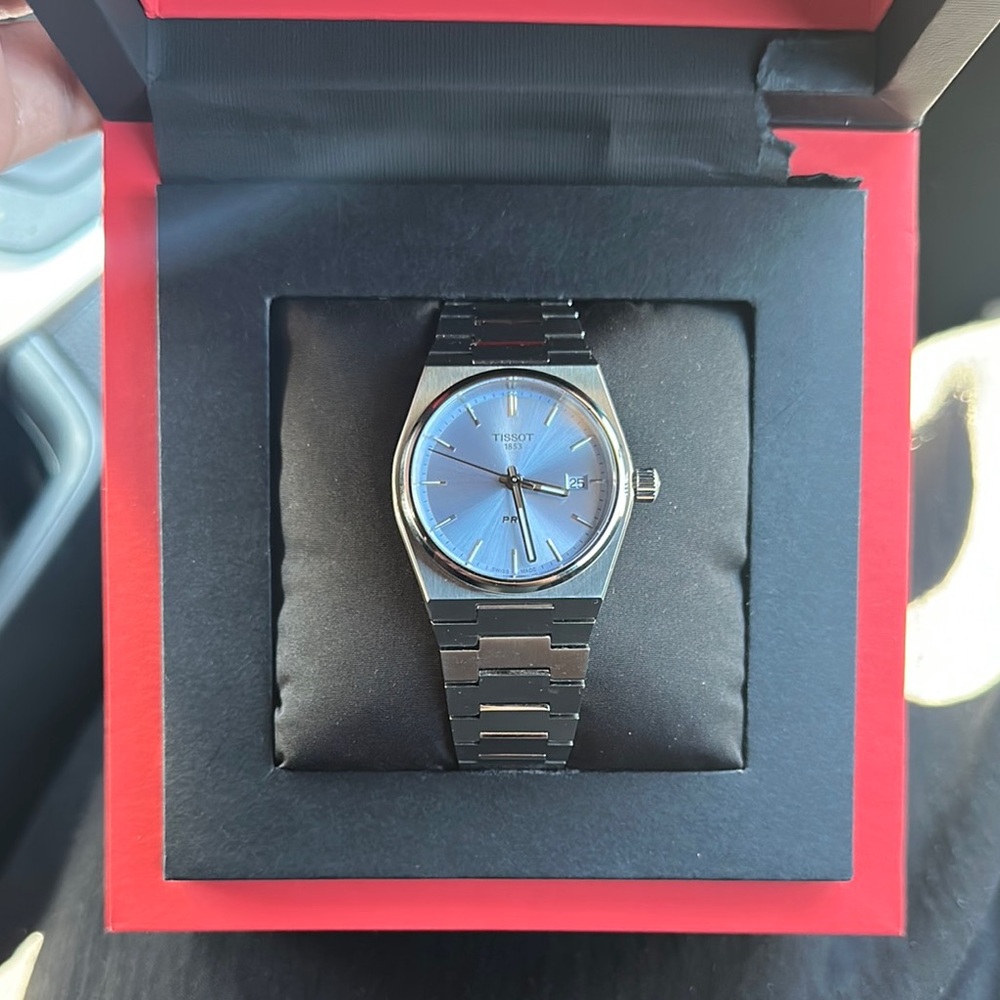 Tissot Classic Silver Watch with Blue Dial